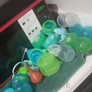 Assorted Baby Bottle Accessories in Green and Teal Never Used..
